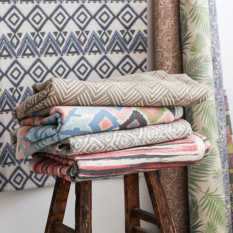 Patchwork runner made of flat-woven cotton blend with graphic stripe and checkered fields