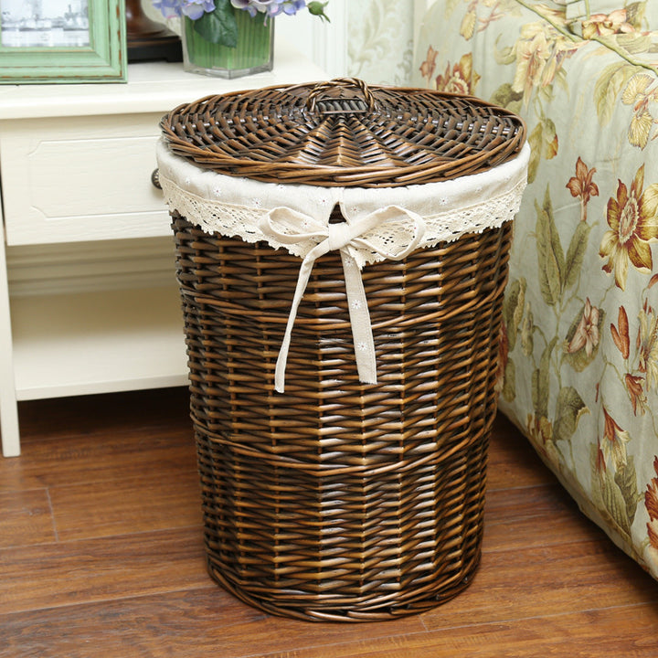 Women's laundry basket made of woven natural material with decorative fabric lining Stornfield