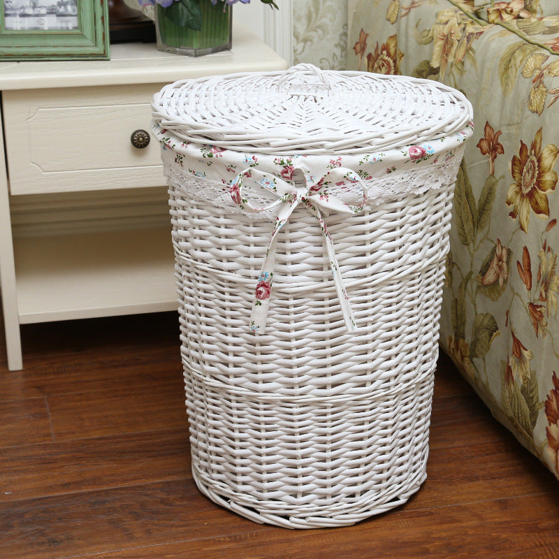 Women's laundry basket made of woven natural material with decorative fabric lining Stornfield