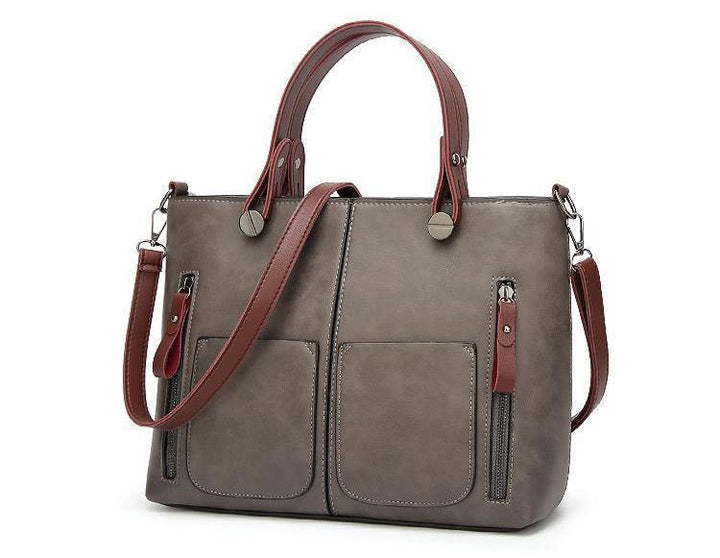 Cera - Vintage handbag with double front pocket | Stornfield