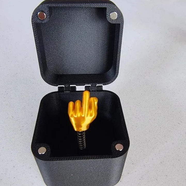 Middle finger in a box | Stornfield
