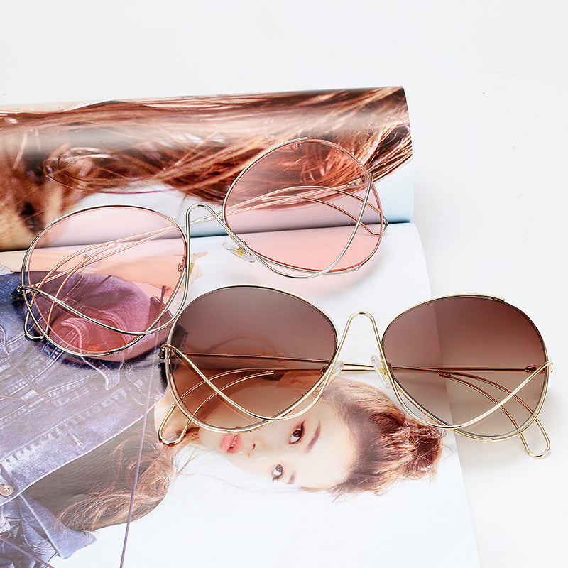 Ladies' fashion half-frame glasses with intricate, minimalist design Stornfield