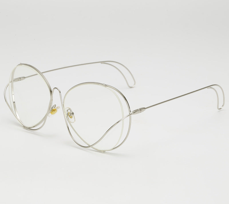 Ladies' fashion half-frame glasses with intricate, minimalist design Stornfield