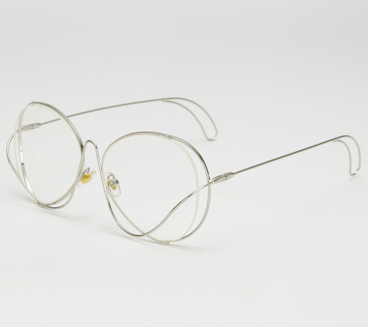 Ladies' fashion half-frame glasses with intricate, minimalist design Stornfield