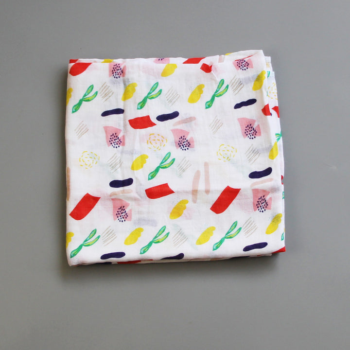 Organic Cotton Dinosaur Print Muslin Swaddle Stornfield