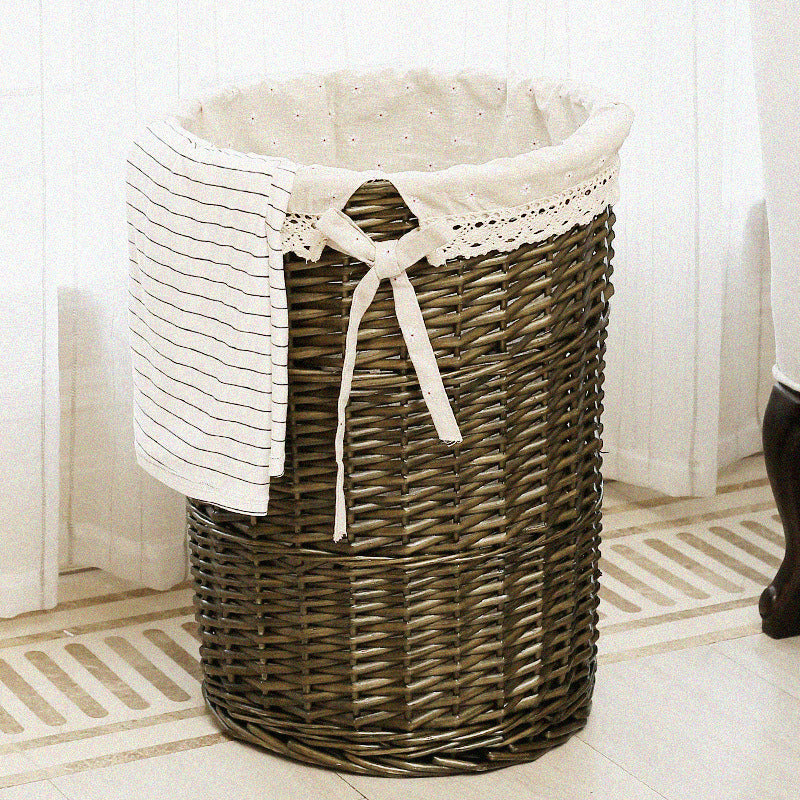 Women's laundry basket made of woven natural material with decorative fabric lining Stornfield