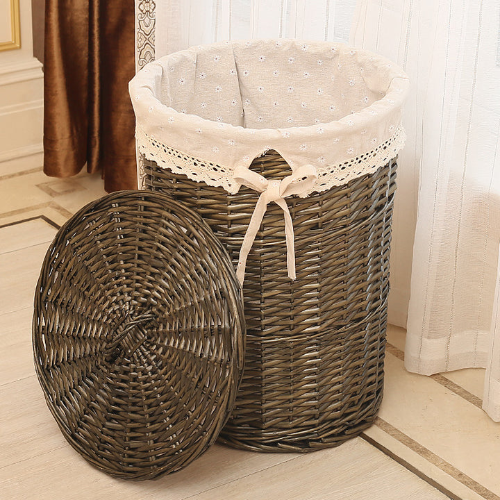 Women's laundry basket made of woven natural material with decorative fabric lining Stornfield