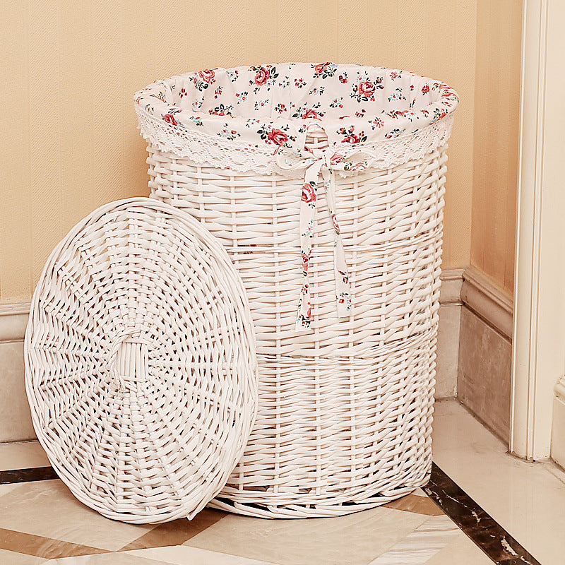 Women's laundry basket made of woven natural material with decorative fabric lining Stornfield