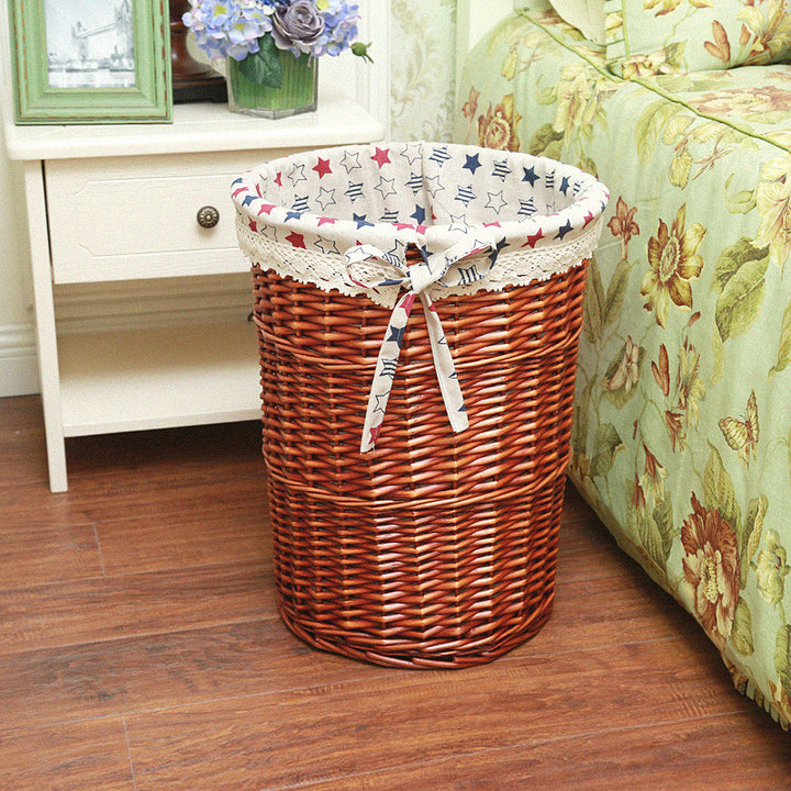 Women's laundry basket made of woven natural material with decorative fabric lining Stornfield