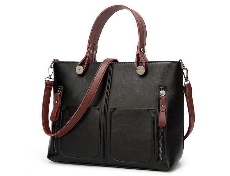 Cera - Vintage handbag with double front pocket | Stornfield