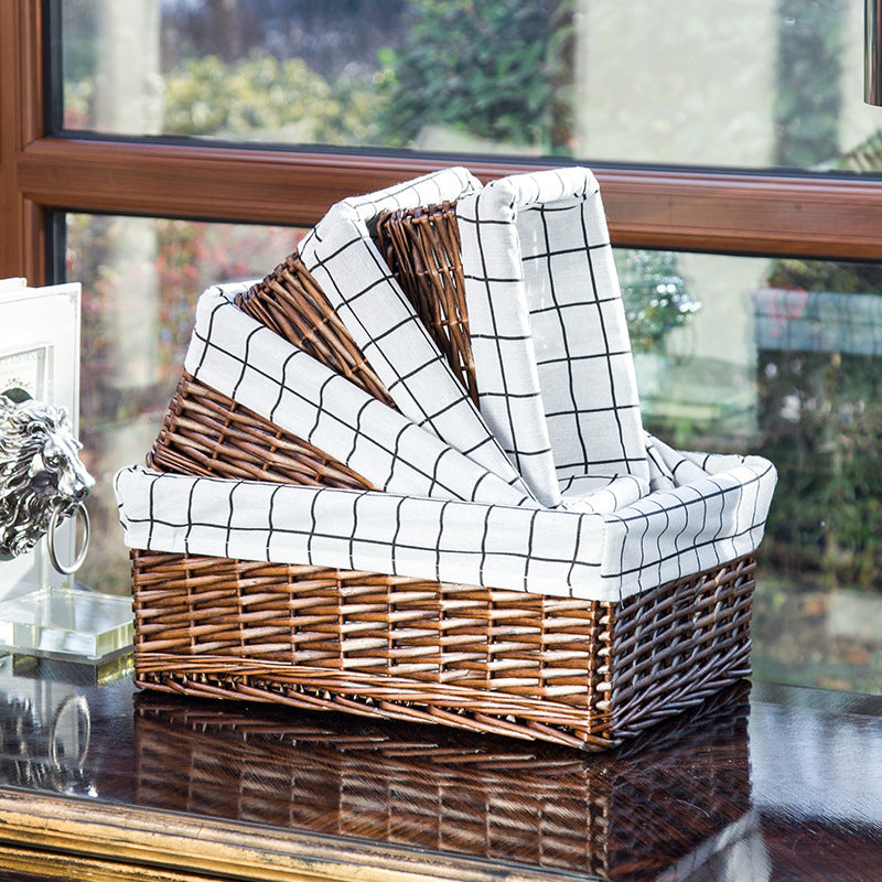 Women's storage basket made of woven natural material with decorative fabric cover Stornfield