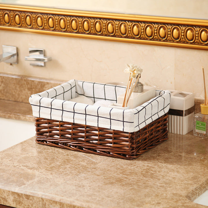 Women's storage basket made of woven natural material with decorative fabric cover Stornfield