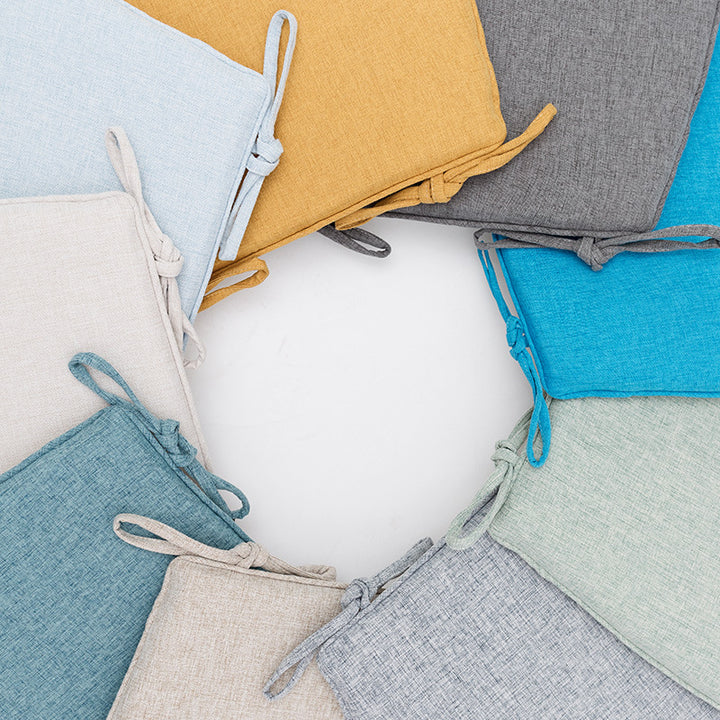 Padded chair cushion with ties in linen look