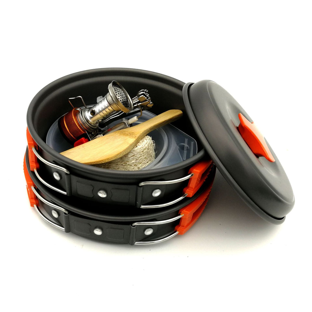 lightweight nesting camping cookware set with folding heat-resistant handles integrated compact stove and utensils Stornfield