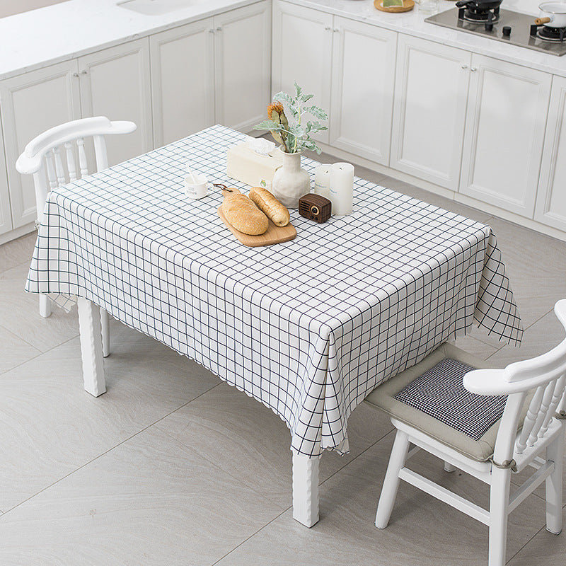 Wipeable tablecloth with fine check pattern, wavy hem and easy-care PVC finish Stornfield