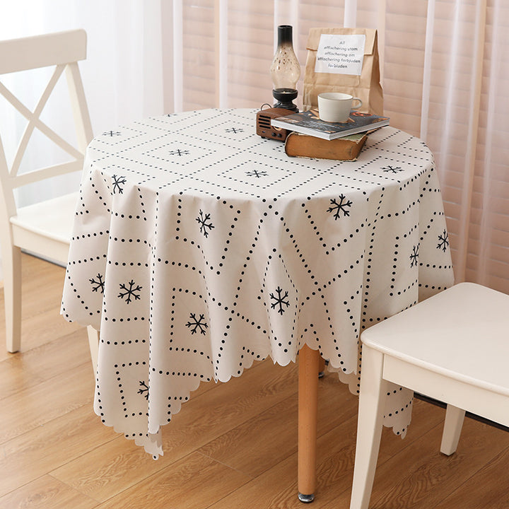 Wipeable tablecloth with fine check pattern, wavy hem and easy-care PVC finish Stornfield