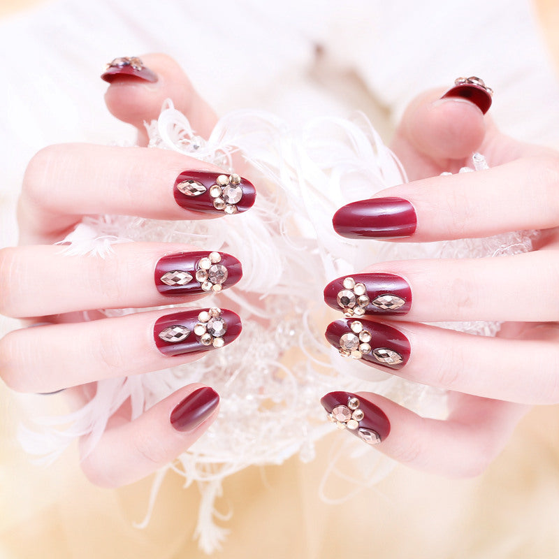 Artificial nails with delicate floral decorations Stornfield
