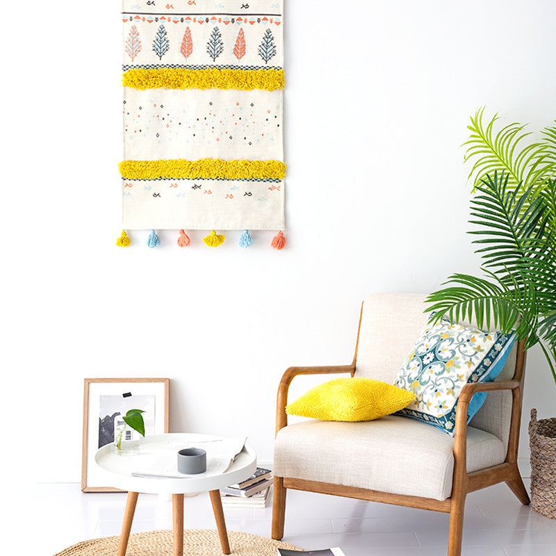 Wall tapestry in Scandi-Boho style with tufting stripes, tassels, and wooden rod Stornfield