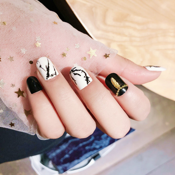 Artistic Press-On Nail Set with Geometric and Marble Patterns