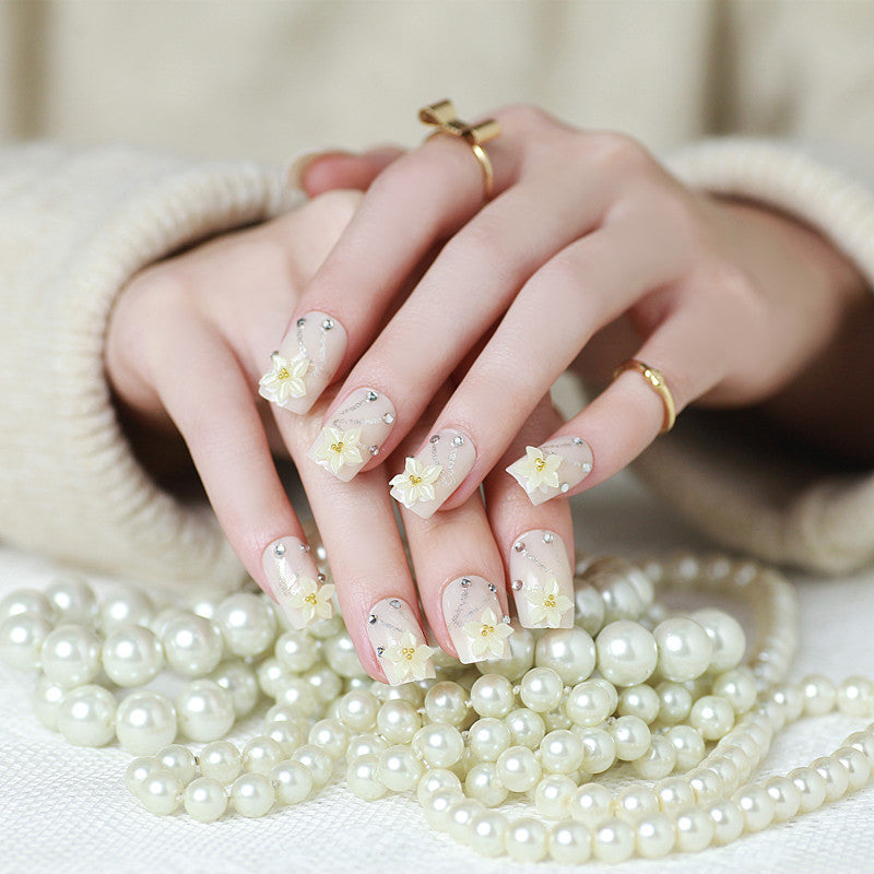 Artificial nails with delicate floral decorations Stornfield