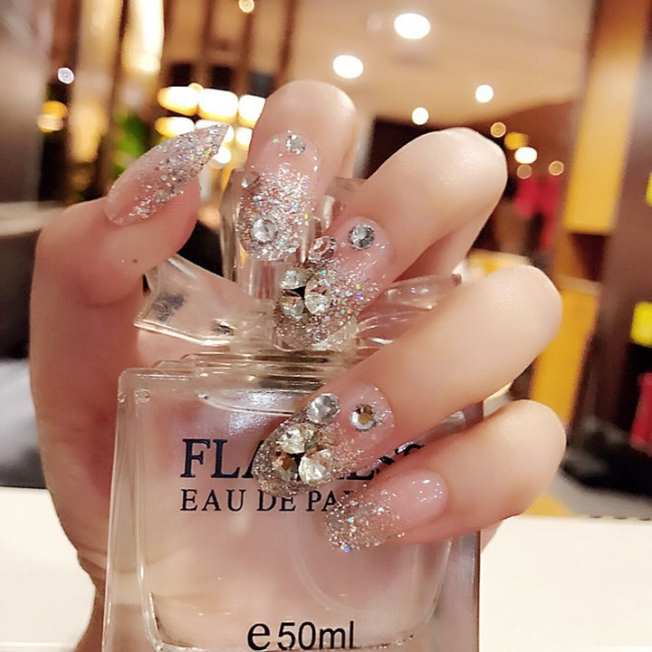 Artificial nails with delicate floral decorations Stornfield