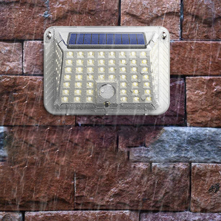 Modern Simplicity Solar Waterproof Triangle Silicone ABS PC LED Outdoor Wall Sconce Lamp For Outdoor Patio | Stornfield