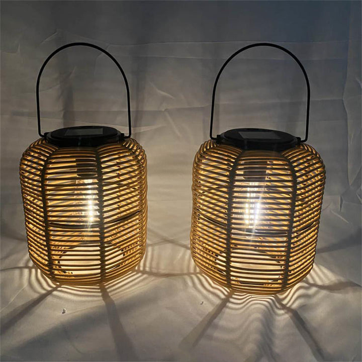 Modern Art Deco Solar Waterproof Cylinder Lantern Hollow Out Plastic Iron LED Outdoor Light For Garden | Stornfield