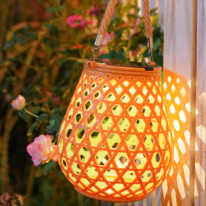 Traditional Chinese Solar Waterproof Oval Round Hollow Mesh ABS LED Outdoor Landscape Light For Garden | Stornfield