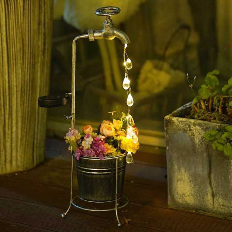 Modern Art Deco Solar Faucet Water Drops Flowing Water Planter Shape Iron LED Outdoor Light For Garden | Stornfield