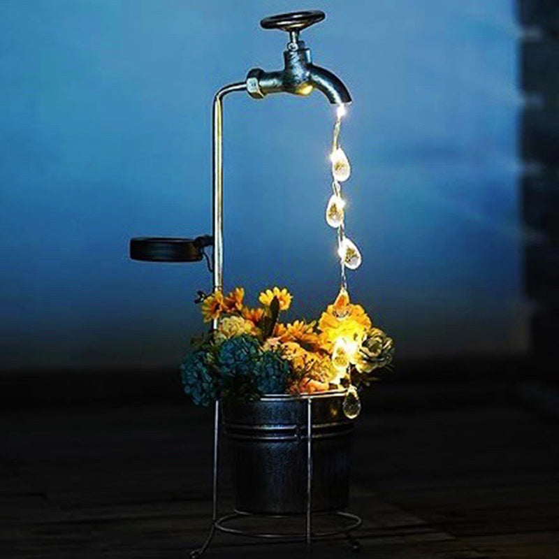 Modern Art Deco Solar Faucet Water Drops Flowing Water Planter Shape Iron LED Outdoor Light For Garden | Stornfield