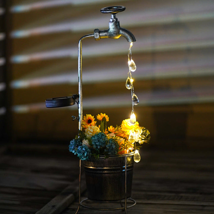 Modern Art Deco Solar Faucet Water Drops Flowing Water Planter Shape Iron LED Outdoor Light For Garden | Stornfield