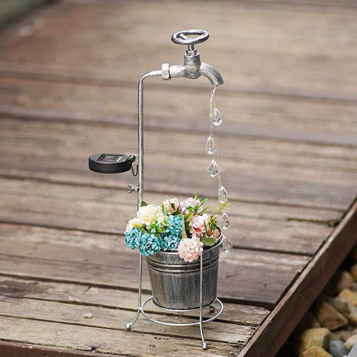 Modern Art Deco Solar Faucet Water Drops Flowing Water Planter Shape Iron LED Outdoor Light For Garden | Stornfield