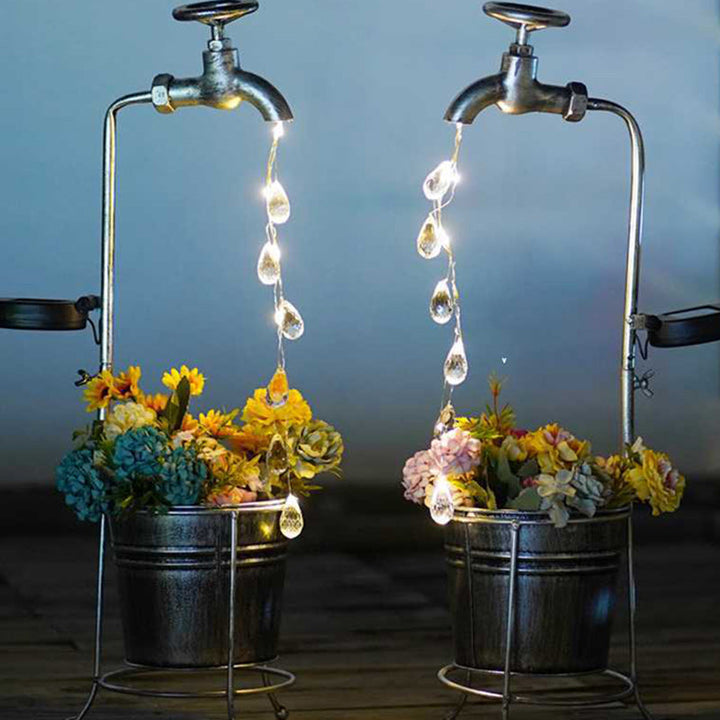 Modern Art Deco Solar Faucet Water Drops Flowing Water Planter Shape Iron LED Outdoor Light For Garden | Stornfield