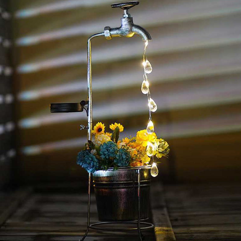 Modern Art Deco Solar Faucet Water Drops Flowing Water Planter Shape Iron LED Outdoor Light For Garden | Stornfield