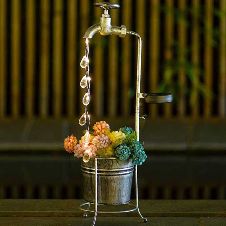 Modern Art Deco Solar Faucet Water Drops Flowing Water Planter Shape Iron LED Outdoor Light For Garden | Stornfield