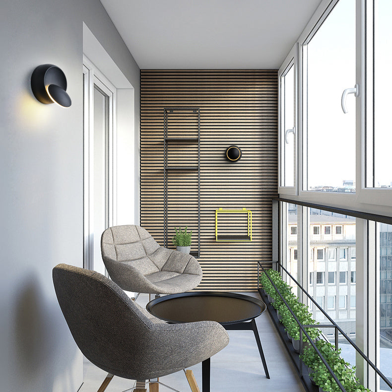 Stornfield | Contemporary Nordic Iron Rotating Eclipse Round LED Wall Sconce for Bedside