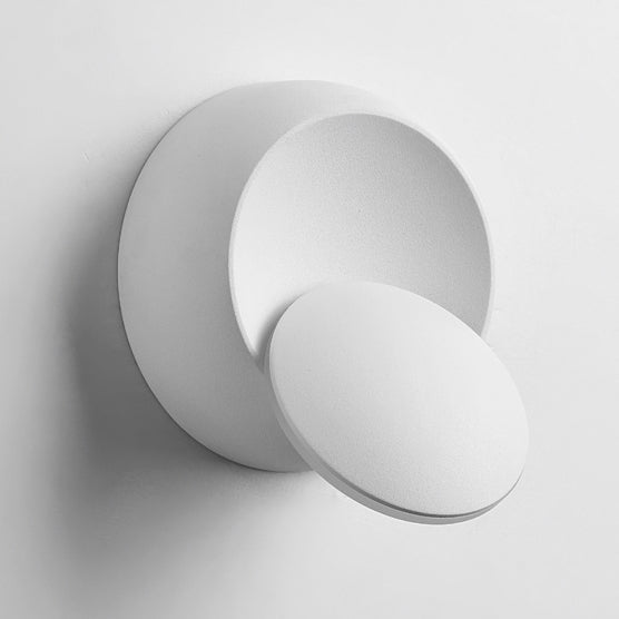 Stornfield | Contemporary Nordic Iron Rotating Eclipse Round LED Wall Sconce for Bedside