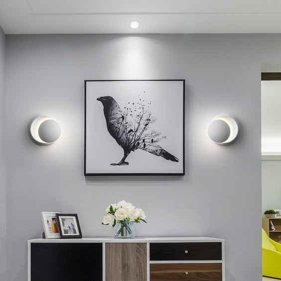 Stornfield | Contemporary Nordic Iron Rotating Eclipse Round LED Wall Sconce for Bedside