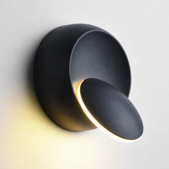 Stornfield | Contemporary Nordic Iron Rotating Eclipse Round LED Wall Sconce for Bedside