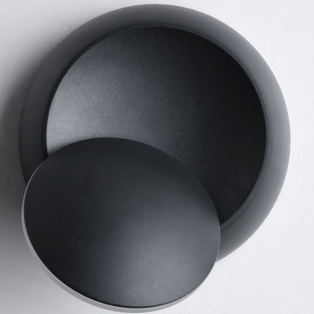 Stornfield | Contemporary Nordic Iron Rotating Eclipse Round LED Wall Sconce for Bedside