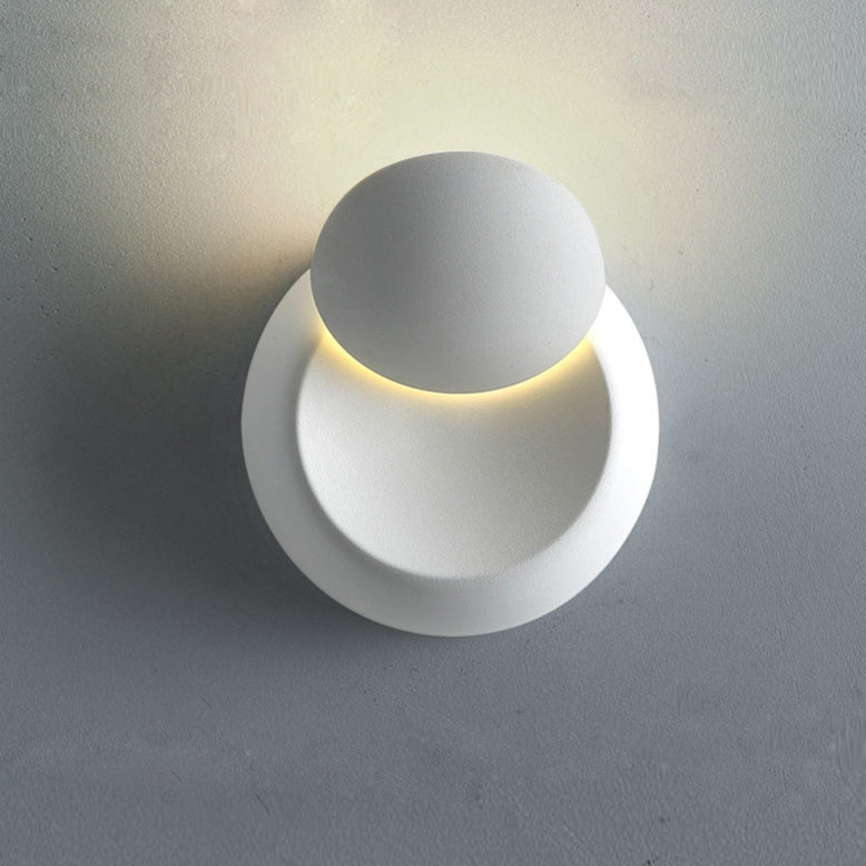 Stornfield | Contemporary Nordic Iron Rotating Eclipse Round LED Wall Sconce for Bedside
