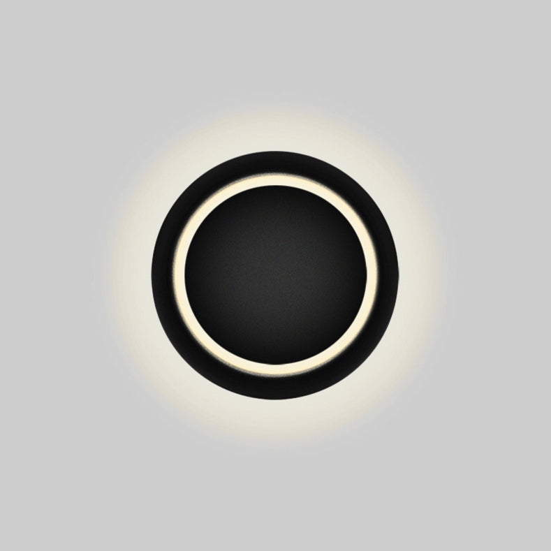 Stornfield | Contemporary Nordic Iron Rotating Eclipse Round LED Wall Sconce for Bedside
