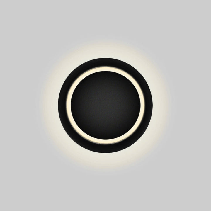 Stornfield | Contemporary Nordic Iron Rotating Eclipse Round LED Wall Sconce for Bedside