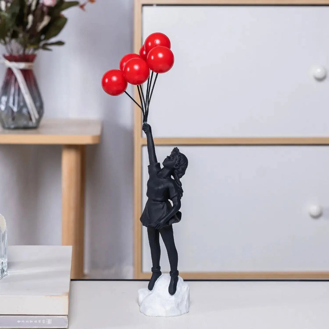 Stornfield | Banksy flying balloon girl statue