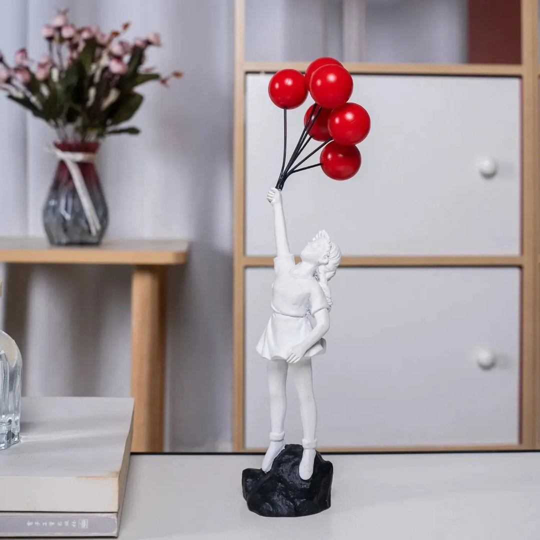 Stornfield | Banksy flying balloon girl statue