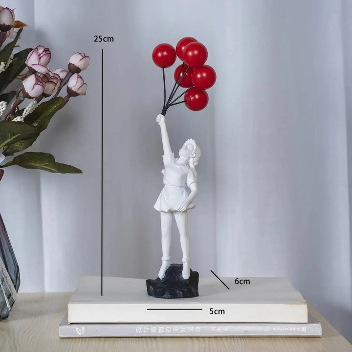 Stornfield | Banksy flying balloon girl statue