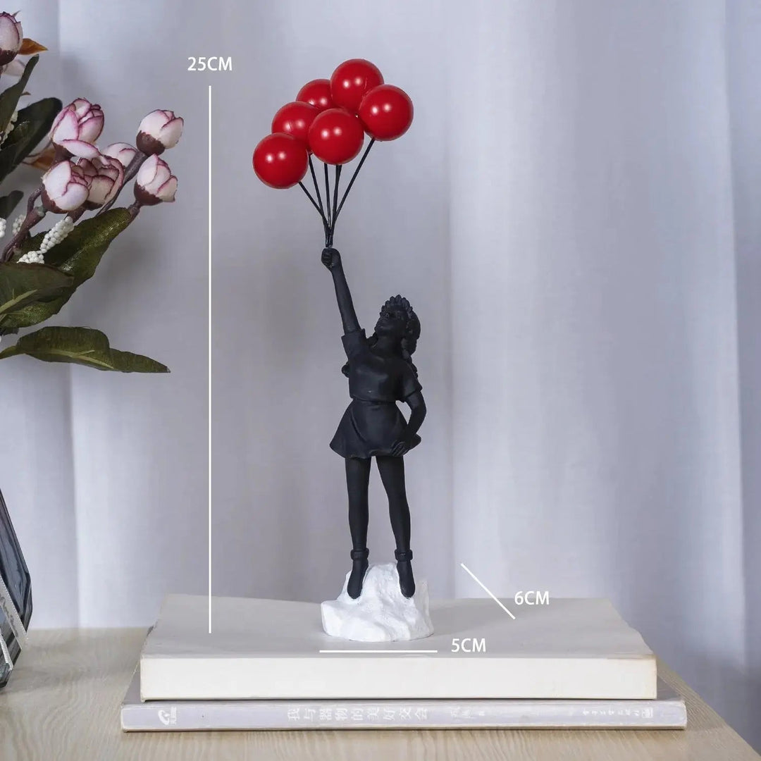 Stornfield | Banksy flying balloon girl statue