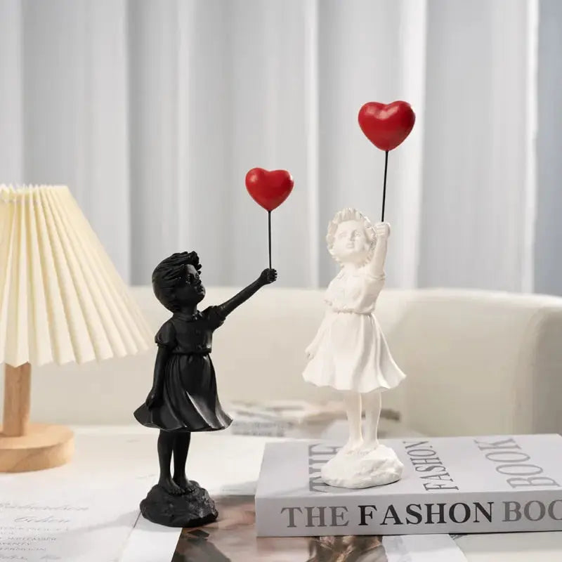 Stornfield | Banksy flying balloon girl statue