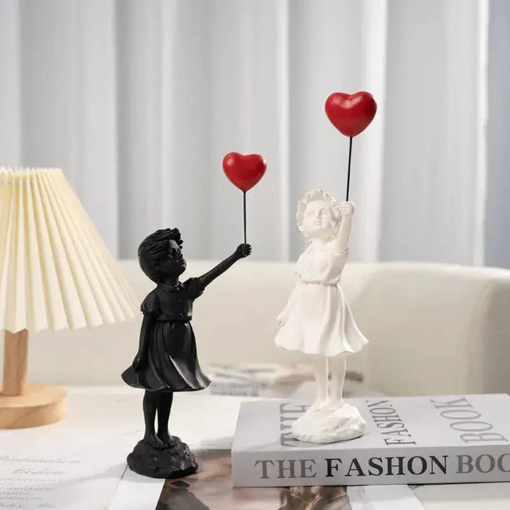 Stornfield | Banksy flying balloon girl statue