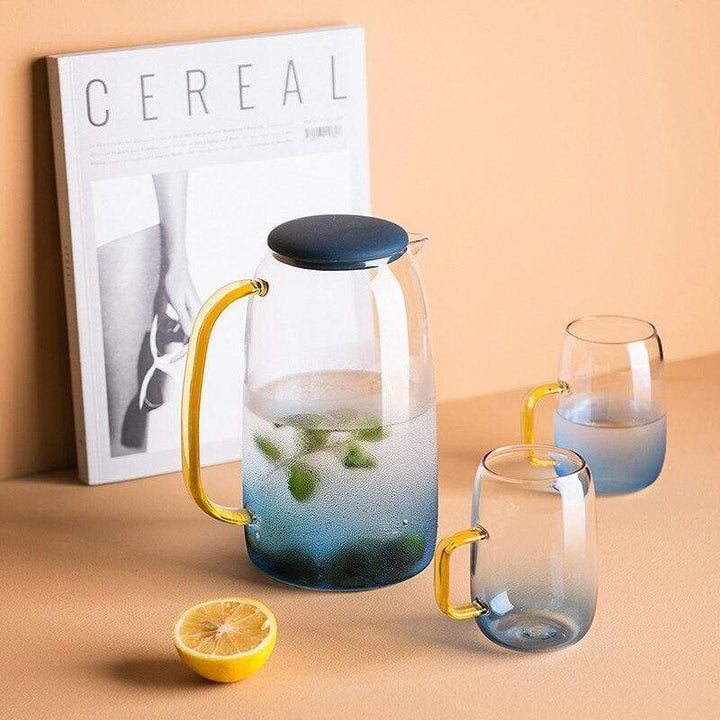 Blue glass pitcher with matching drinking glass Stornfield